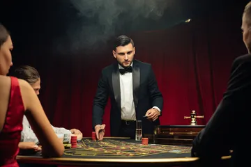 A woman smiling by bright slot machines showing lucky symbols, showcasing the exciting slot offerings at YAMANPLUS.